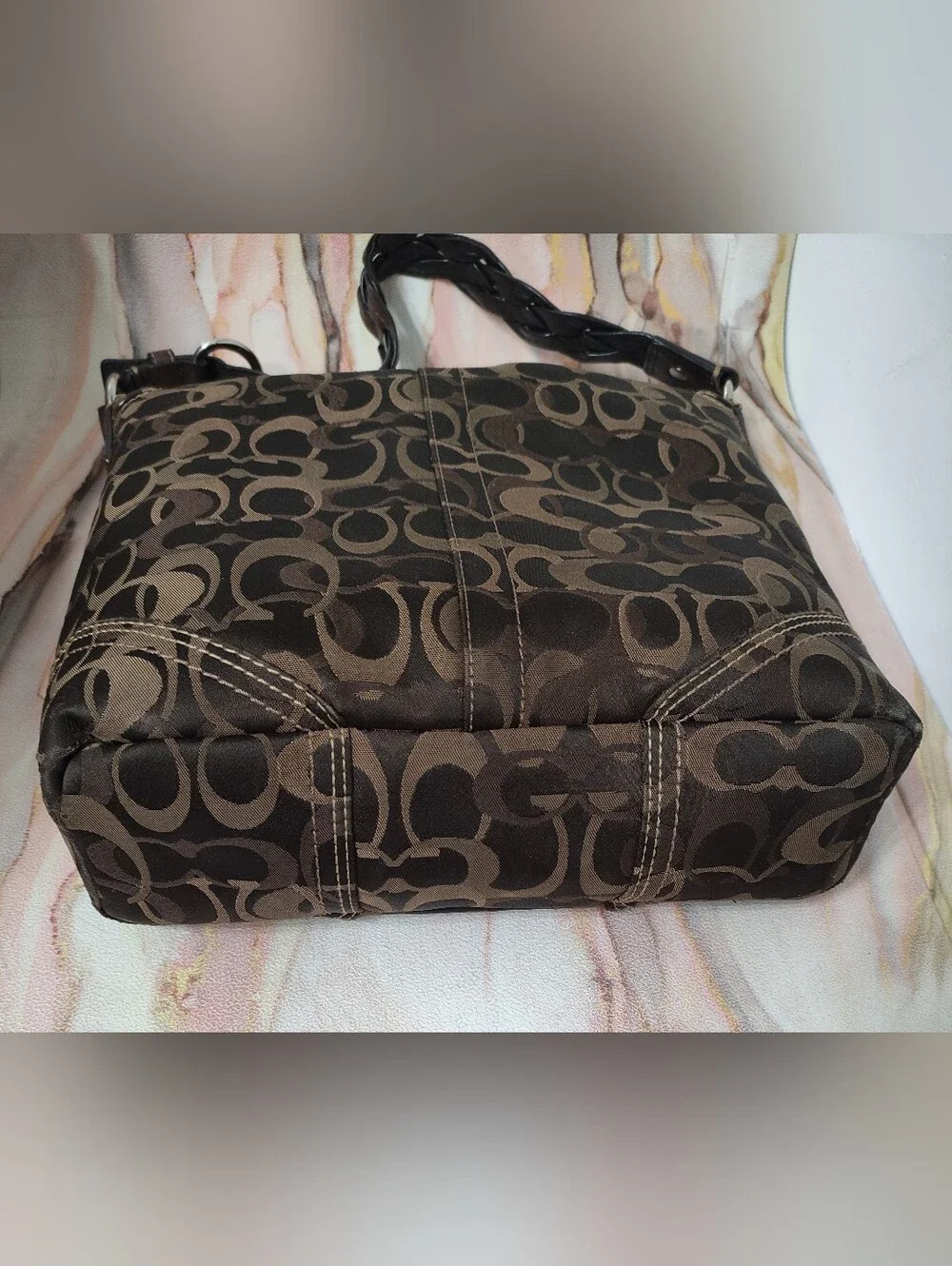 Coach signature fabric